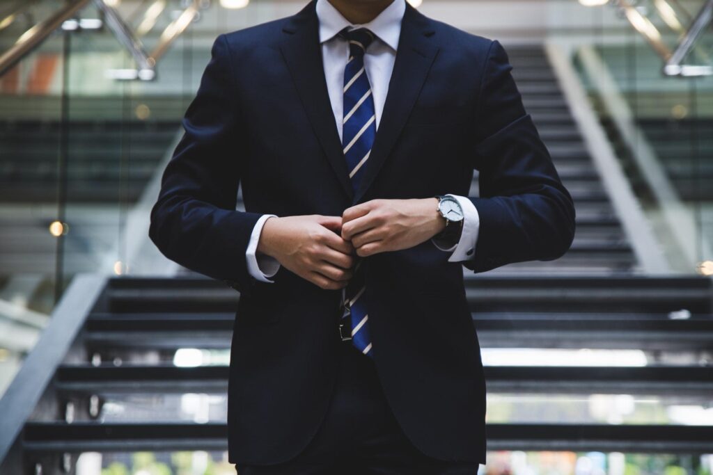 Local director dressed in a suit and tie in a Singapore company